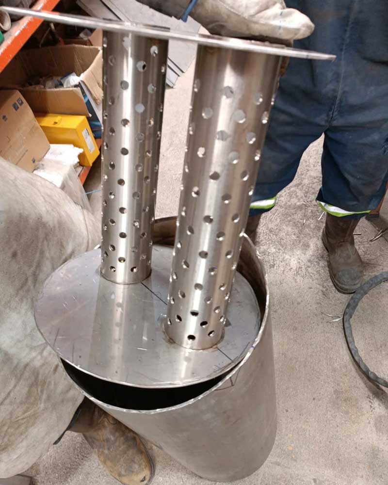 Fabricación de silenciador de escapes de bombas de vacío